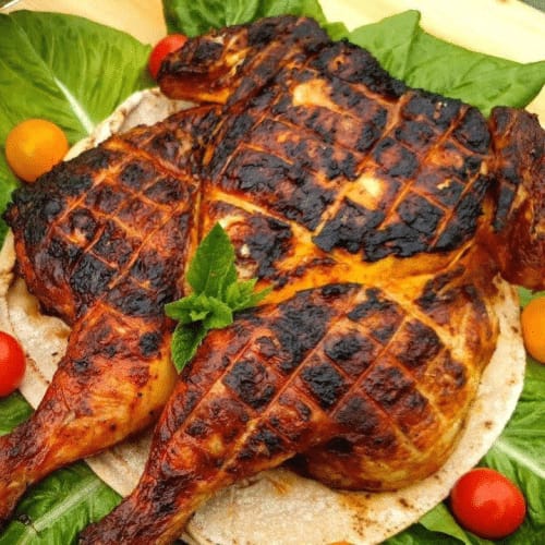 Halb gegrilltes Hähnchen